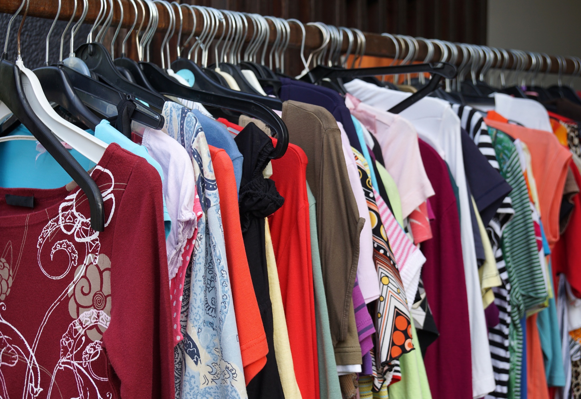 2nd hand sale clothes rack with a selection of fashion for women at thrift store