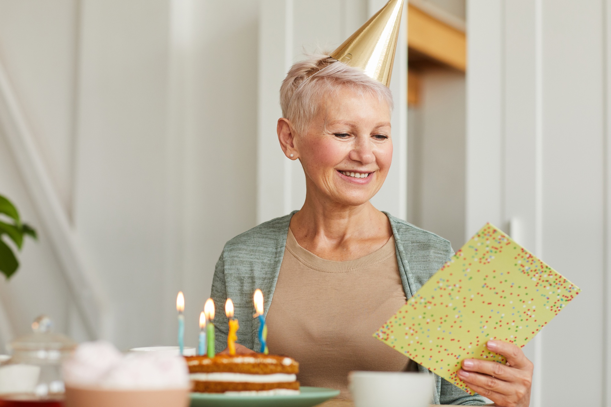 Birthday woman with card