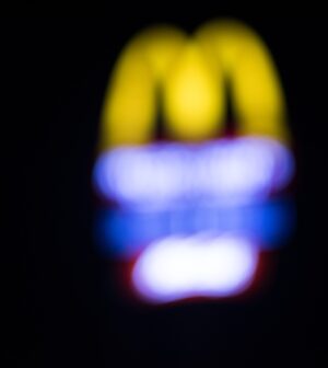 Blurred background of McDonald’s signage at night