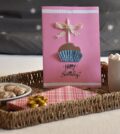 Gift, birthday card and breakfast in bed