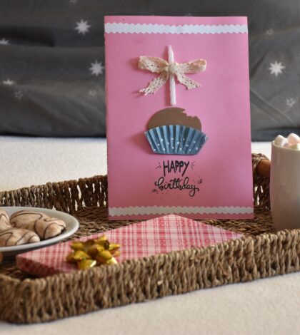 Gift, birthday card and breakfast in bed