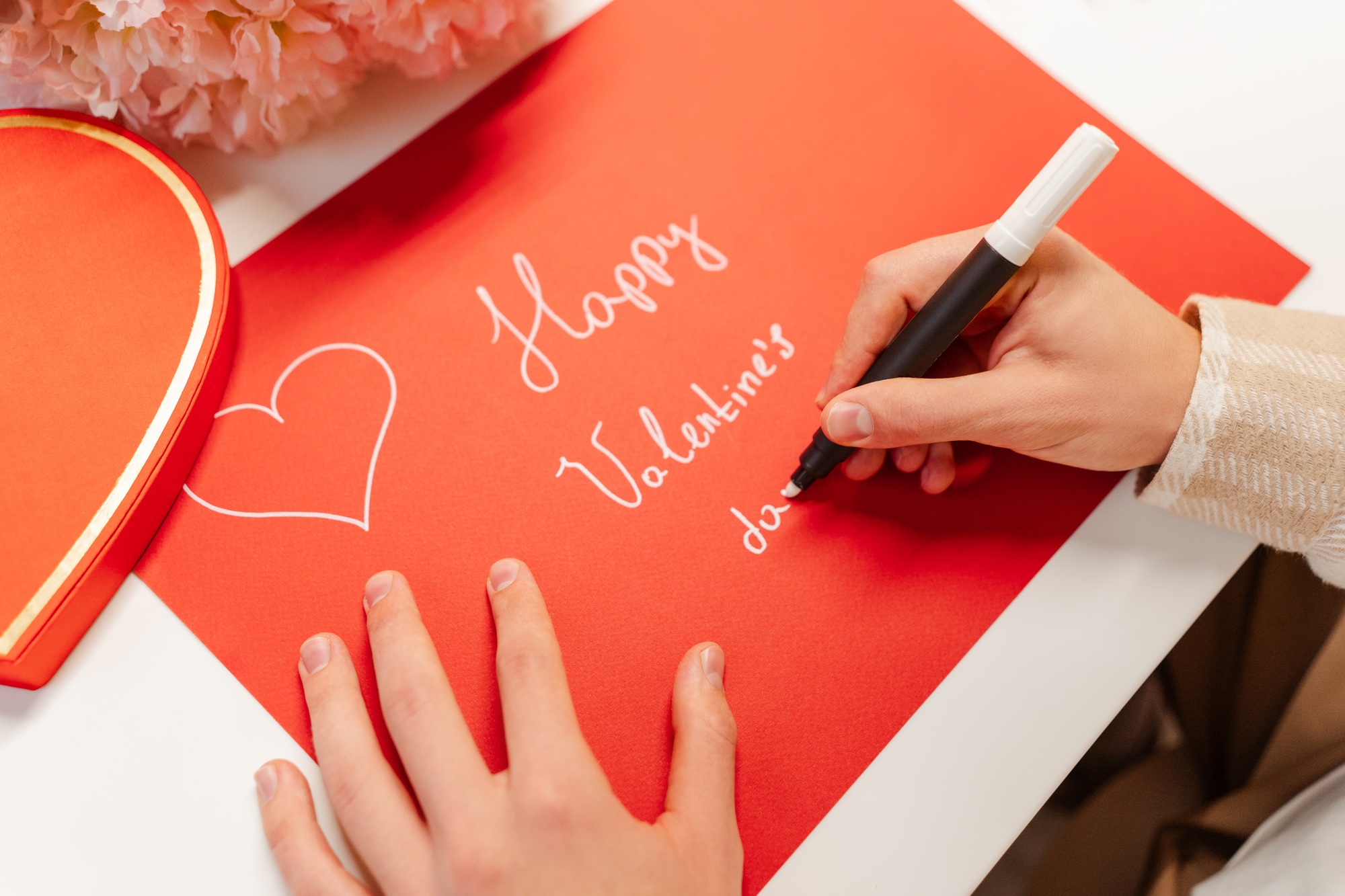 Hand writing love letter on Valentines day, selective focus. Holiday, romantic, feelings concept