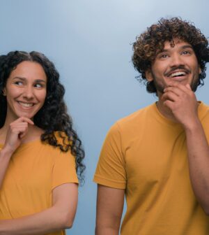 Multiracial diverse couple two friends family man woman together think pondering problem decision
