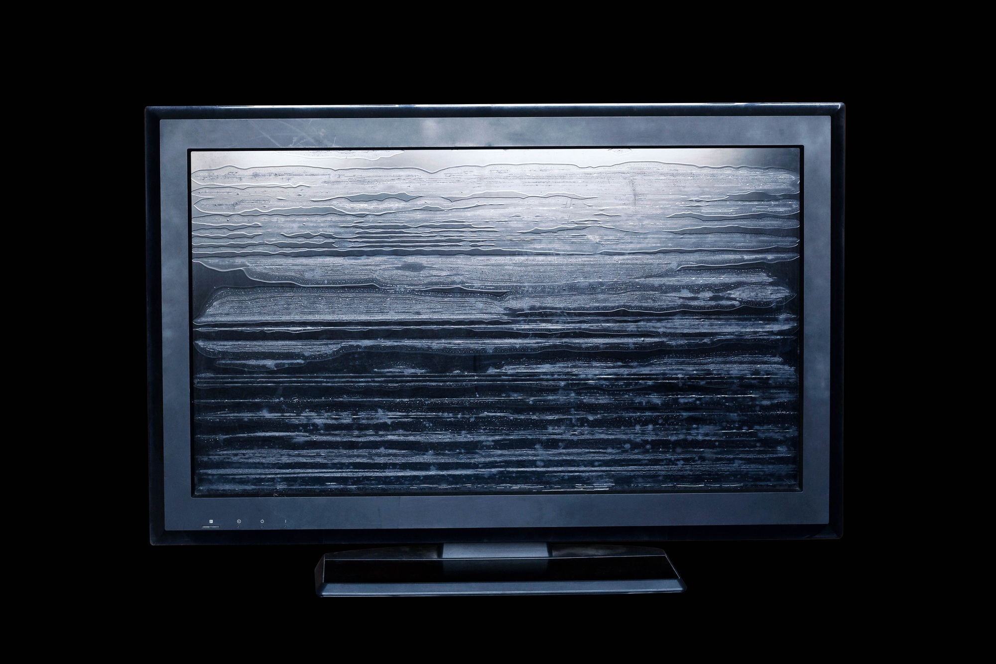 Old television on black background