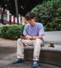 Skater man sending a text message