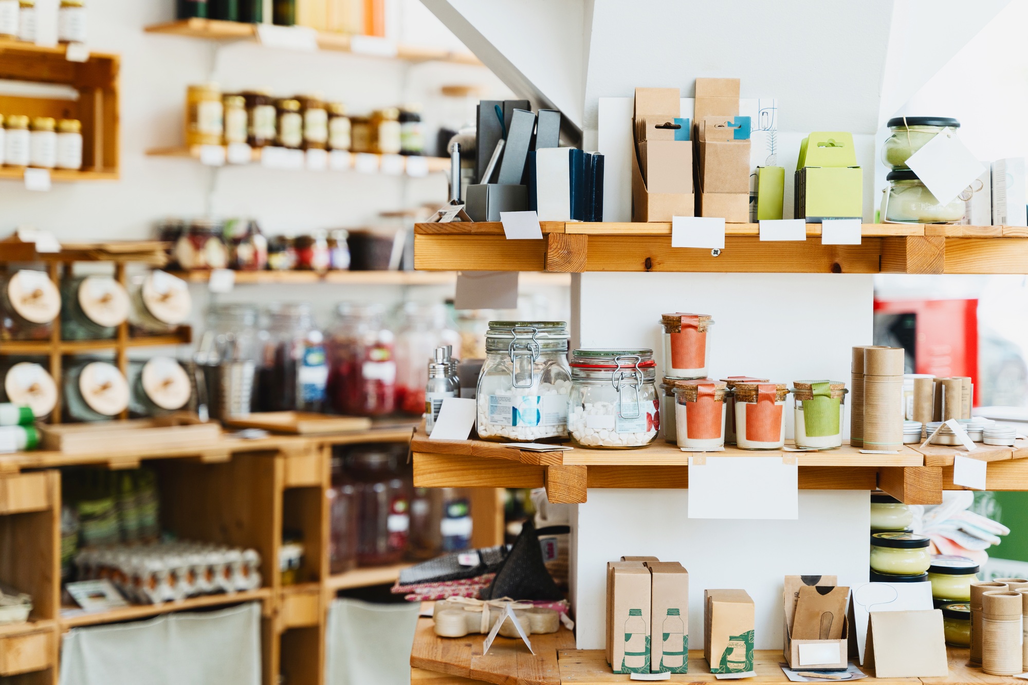 Zero waste shop interior. Wooden shelves with varieties of cosmetic products.